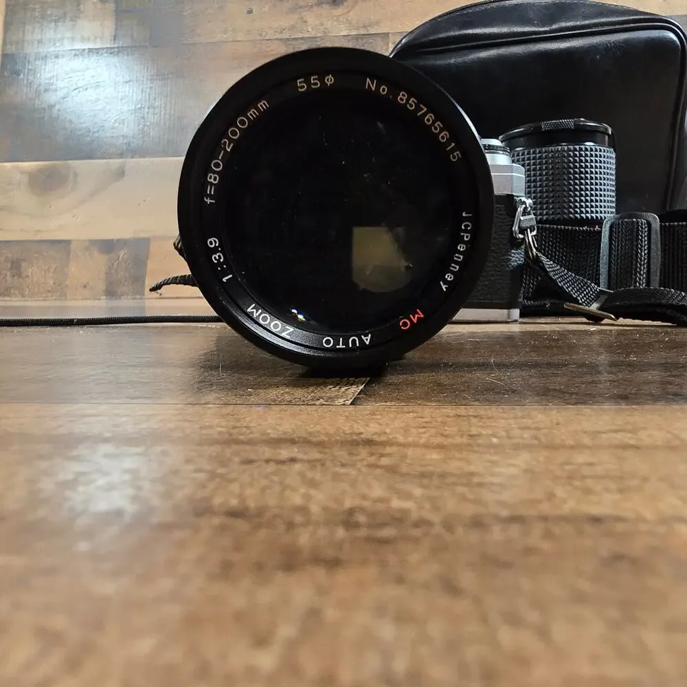 Minolta X370 with a JC Penny f=80 to 200mm zoom lens and prospect f=28-70mm lens